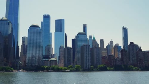 Modern High Rising Glass Buildings of Manhattan with Reflections on Windows