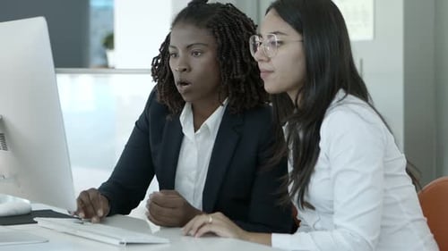 Businesswomen Working Together in Modern Office