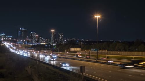 Motion Time Lapse Of Night Time Busy City Highway