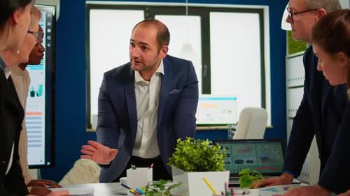 Diverse Team Collaborating in Modern Office Meeting