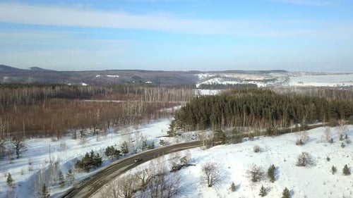 Car On The Winter Forest Road