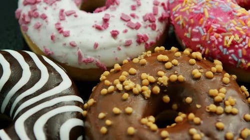 Glazed Sweet Doughnuts in Closeup