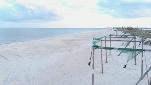 Beautiful sandy beach with empty resort.
