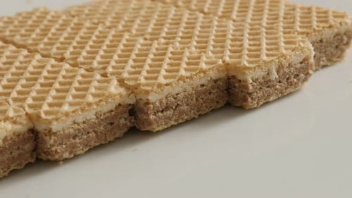 Lot of Israeli type wafer pieces on plate 4K 21560p 30fps UltraHD slow pan footage - Close-up sweet