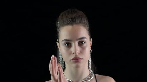 Stylish Young Woman Posing with Silver Jewelry