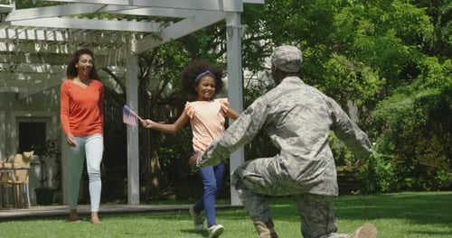 Military Father Returns Home to Family Celebration