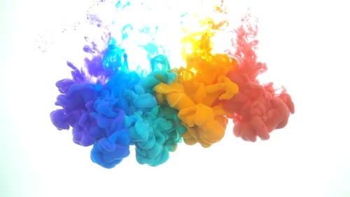 Rainbow Ink Plumes Gracefully Dissolving in Clear Liquid
