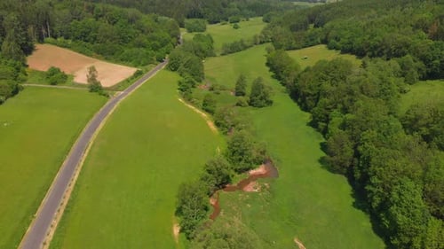 small road passing through beautiful countryside
