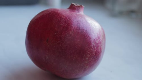 Vibrant Close-Up of a Fresh Pomegranate