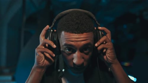 The Player Has His Headphones on and is Ready for an eSports Tournament