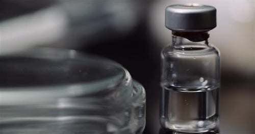 Close Up of Medical Vial with Clear Liquid