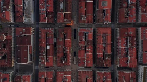 Slow Ascending Aerial Birds Eye Overhead Top Down View of Red Rooftops of Traditional European