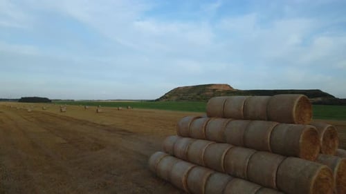 Golden Hay Bales in Rural Farmland Aerial View