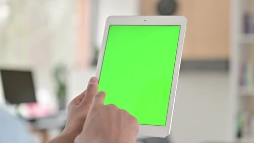 Chroma Key, Rear View of Young African American Man Using Tablet