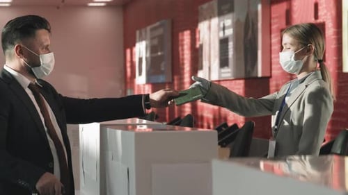 Business Man Passing Passport Control In Airport