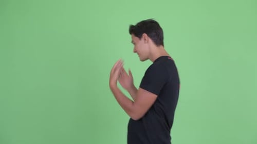 Happy Young Handsome Man Vlogging and Talking To Camera