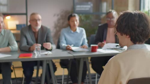 Recruitment Committee Interviewing Candidate in Office