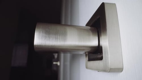 Turning Modern Silver Door Handle Close Up
