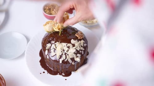 Decorating Chocolate Cake with Roses and Fruit