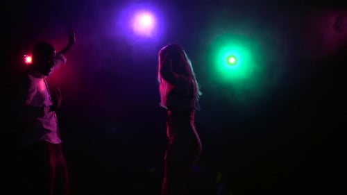 Sexy Couple Dancing in the Disco Style, Close-up, Slow Motion