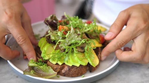 Preparing Healthy Avocado Toast for Breakfast