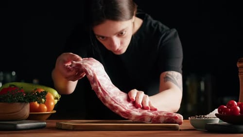 Woman Chef Cooking Ribs Closeup
