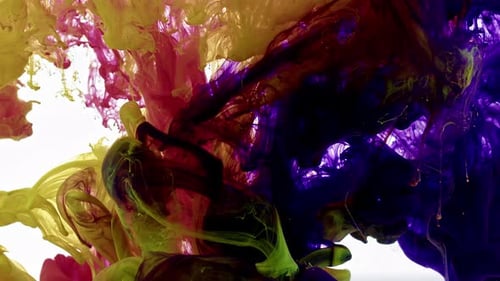 Colorful Ink Swirling Abstractly on White Background
