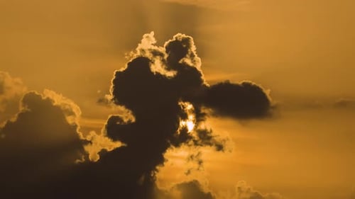 Warm Sunset Sky with Moving Clouds