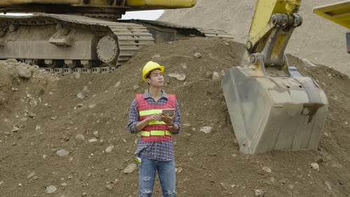 Construction Using A Tablet Computer At A Construction Site