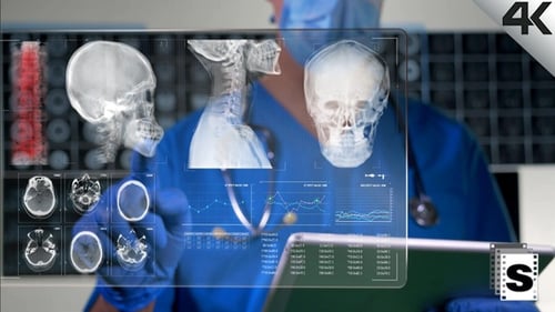 Doctor Interacts with Futuristic Holographic Medical Data