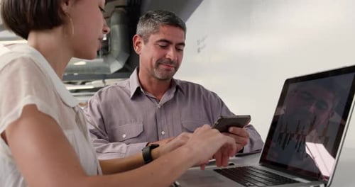 Business people interacting with each other in modern office 4k