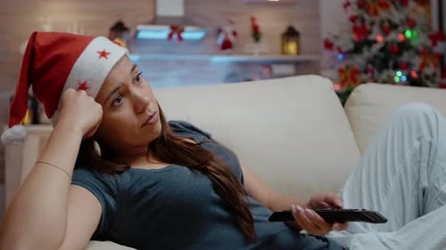 Woman Lounging on Couch on Christmas Holiday