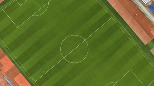 From Above Drone View of Green Soccer Field on Opened Stadium