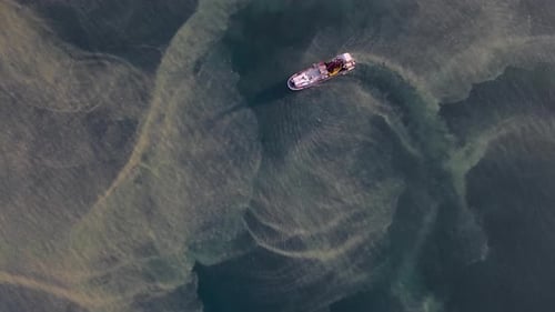 Aerial View of a Boat in the Ocean