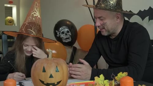 Father and Daughter Celebrate Halloween at Home