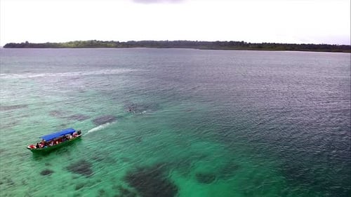 Watersports Activities With Motorboat On Tropical Ocean