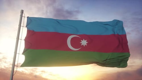 Realistic Waving Azerbaijan Flag Against Golden Sunset Sky