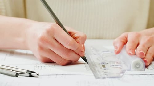 Architect Designer Drawing Plan Blueprint Closeup