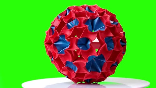 Colorful Origami Ball on Green Screen.