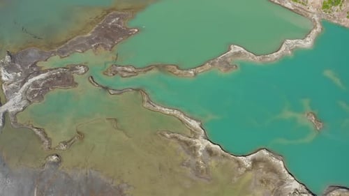 Drone View of the Turquoise Lake Formed As a Result of Mining Waste