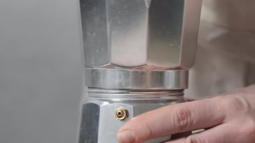 Close Up Woman or Girl Turn Out Geyser Coffee Maker to Pour Water and Put Ground Coffee in It