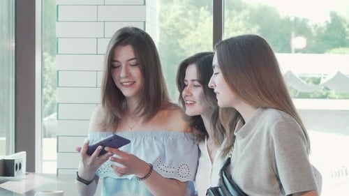 Happy Female Friends Taking Selfies at Brunch at the Coffee Shop
