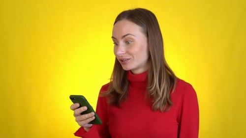 Surprised Woman Isolated on Yellow Background Studio