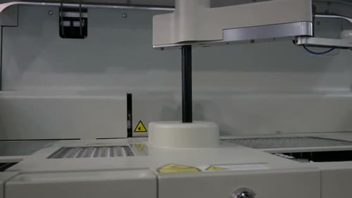 Automated Robotic Arm in Laboratory Sampling Test Tubes
