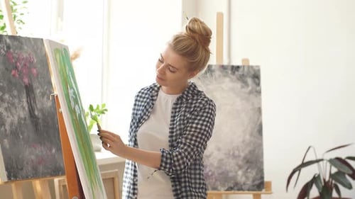Female Beautiful Artist Painting Picture, Using Spatula in Workshop
