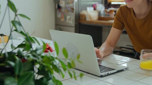 Young Woman Work at Home Office Kitchen on Laptop