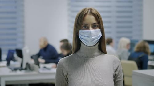 Portrait of Woman with Face Masks in Office, Quarantine Rules, Employee During a Pandemic