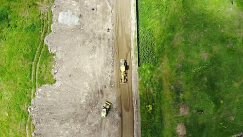 The movement of machinery. Aerial view of the construction road.