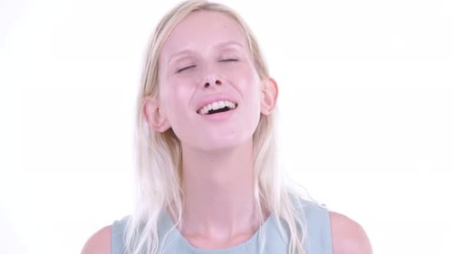 Blond Woman Laughing Happily with Eyes Closed