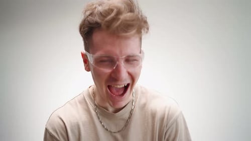 Young Adult with Curly Hair Laughing